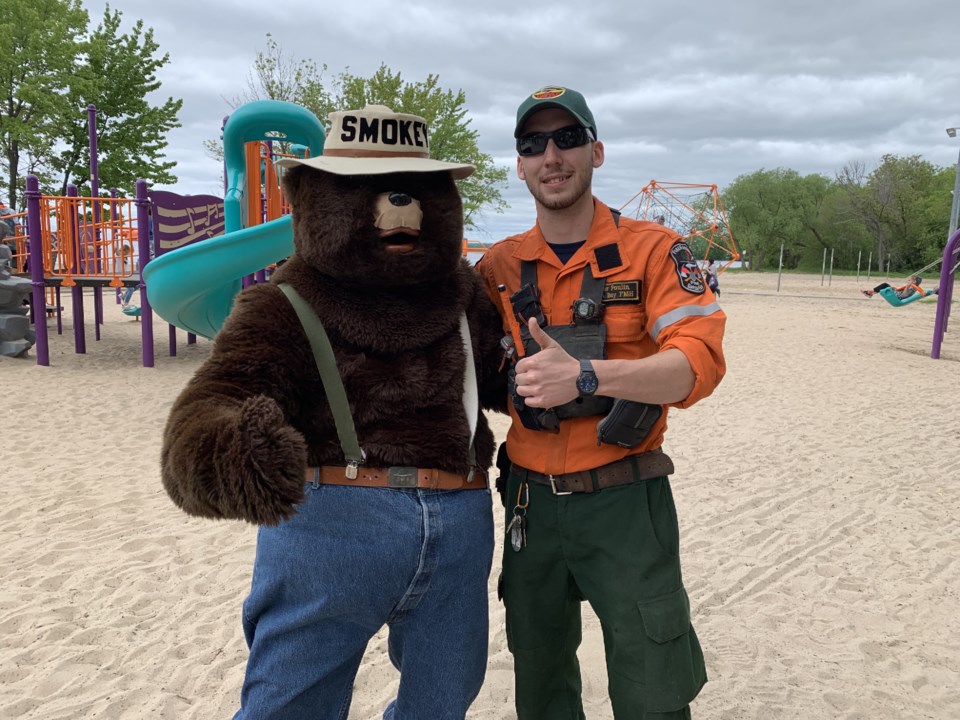 USED 2019-06-20goodmorning  5 Smokey the Bear brings his message to the beach. Photo by Brenda Turl for BayToday.