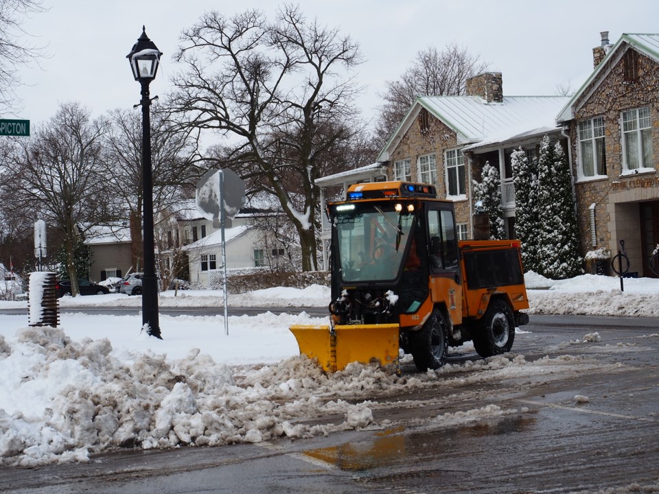USED good-morning-snow-town-worker-clearing-sidewalks