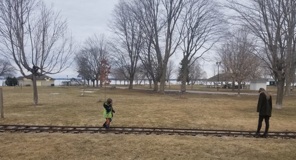 USED 2023-04-11-kid-walking-on-steam-train-track-at-cooch-joella