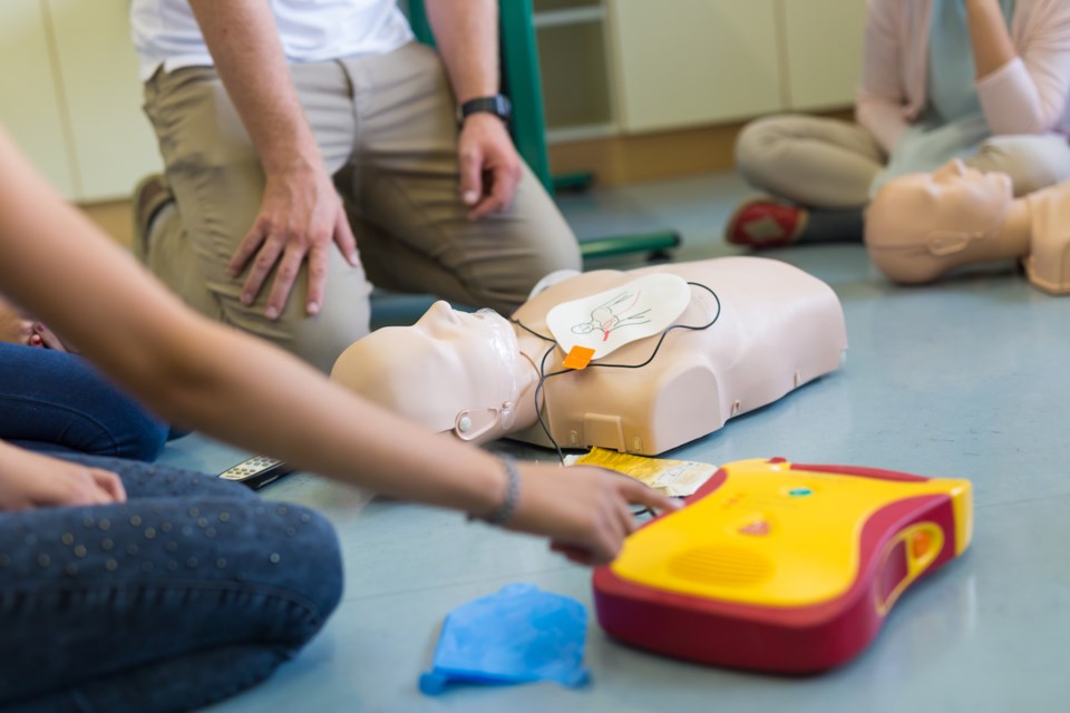 First aid cardiopulmonary resuscitation course using an automated external defibrillator (AED) device. File photo 