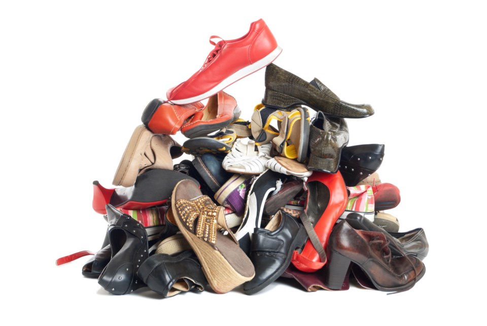 big pile of shoes stock