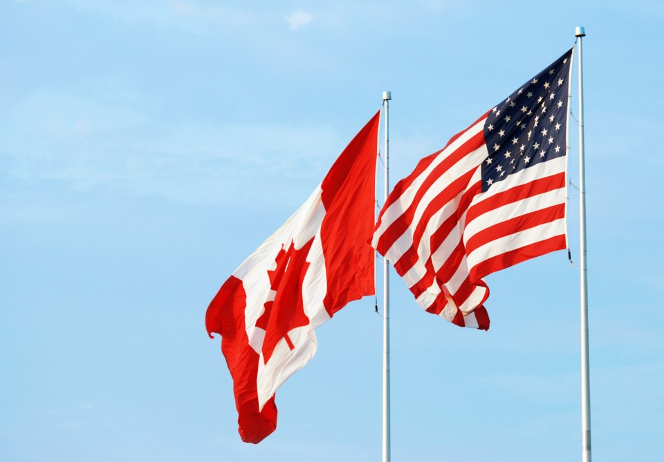  Canadian American Flag AdobeStock_23642913
