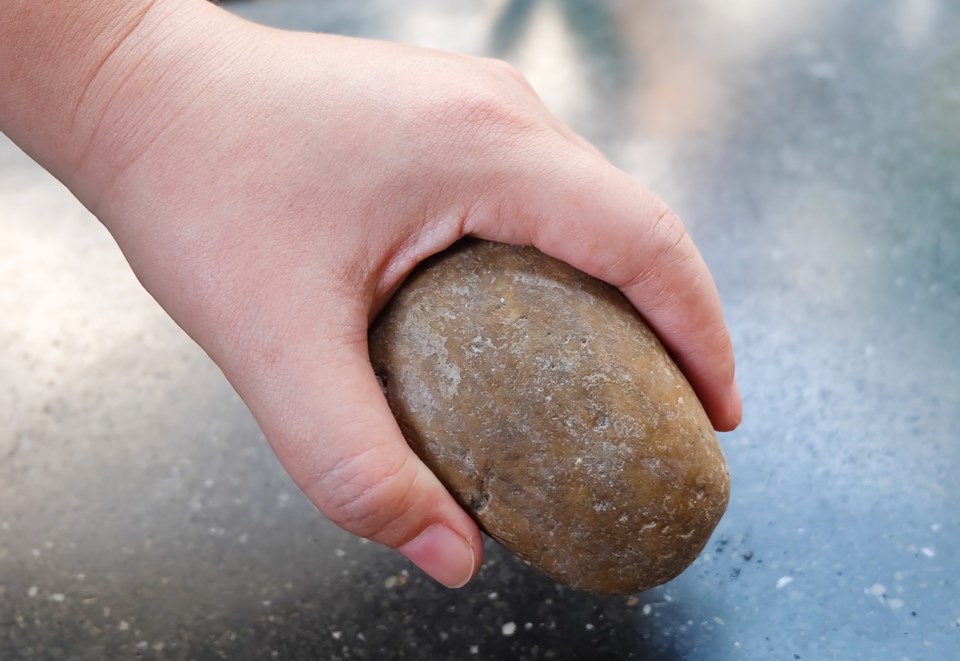 holding rock