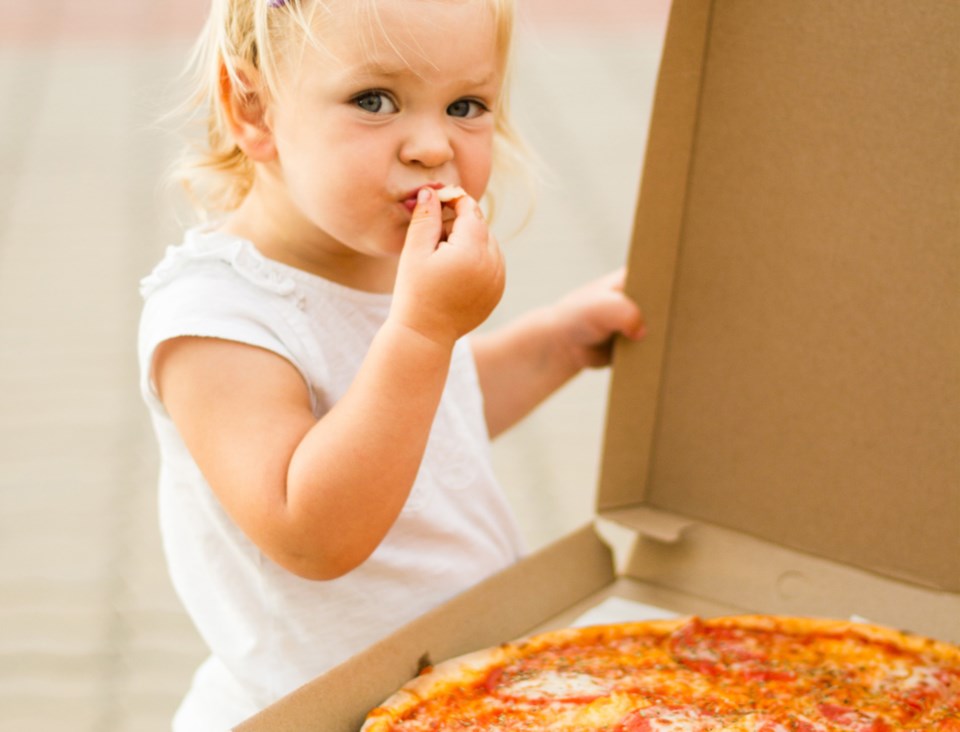 little girl pizza stock