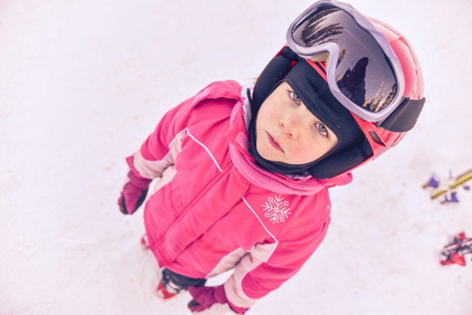 sad skiier kid child stock