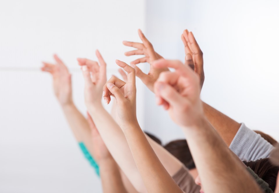 show of hands AdobeStock_63758659