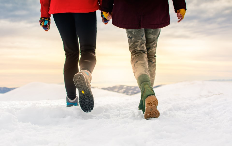 walking winter AdobeStock_187478488