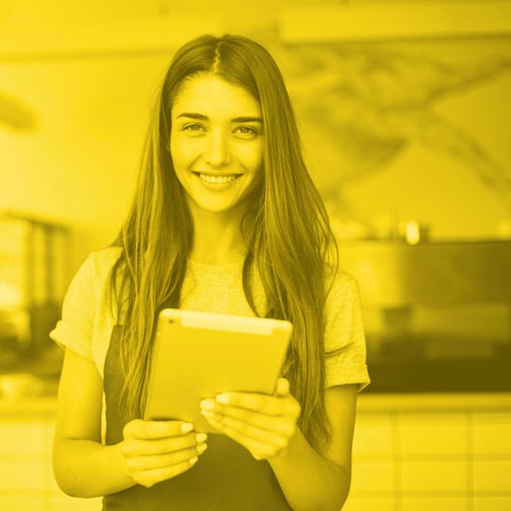 Business owner holding a tablet