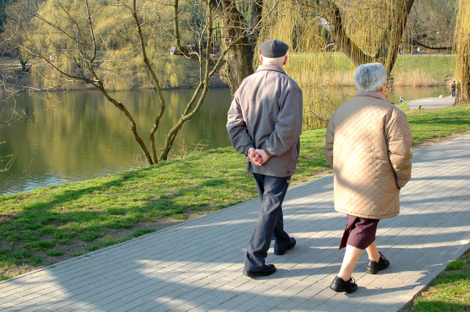 ElderlyWalkinSidewalks