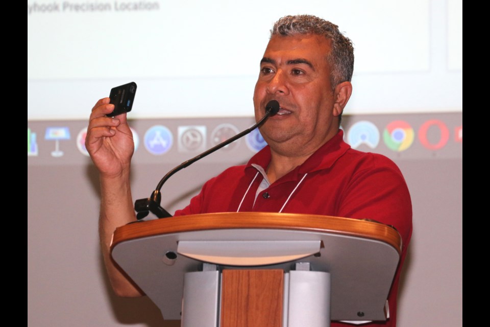 Sarmad Ibrahim, a member of IBM’s National Innovation Team, was in Sudbury Tuesday to help local mining businesses understand the importance of incorporating new technology into their operations. Ibrahim held up an IBM Q, the company’s newest quantum computer. The event was held at the Cambrian College Centre for Smart Mining.  (LEN GILLIS / SMSJ 2019)