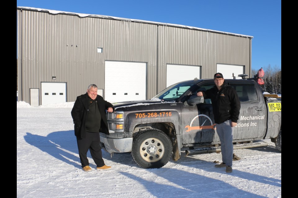 TMS Sales Director Eddy Lamontagne, left, and TMS president Chad Tolonen were pleased to show off the company’s new 12,000-square foot shop in the west end of Timmins earlier this winter.  The company is working the meet the demand for high level heavy equipment technicians in the mining industry. 