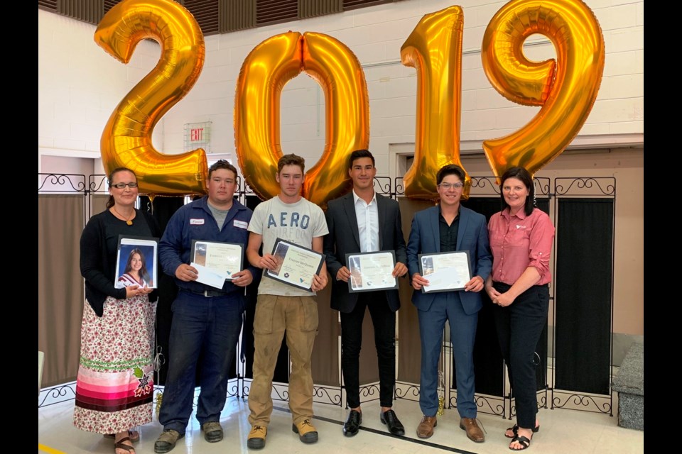 Vale Ontario Operations Scholarship Award winners. From left to right: Jennifer Petahtegoose (in place of her daughter Hannah Morningstar), Forrestt McQueen, Frayser McQueen, Dawson Nootchtai, Conrad Naponse, Danica Pagnutti Senior Advisor, Vale. (PHOTO SUPPLIED)