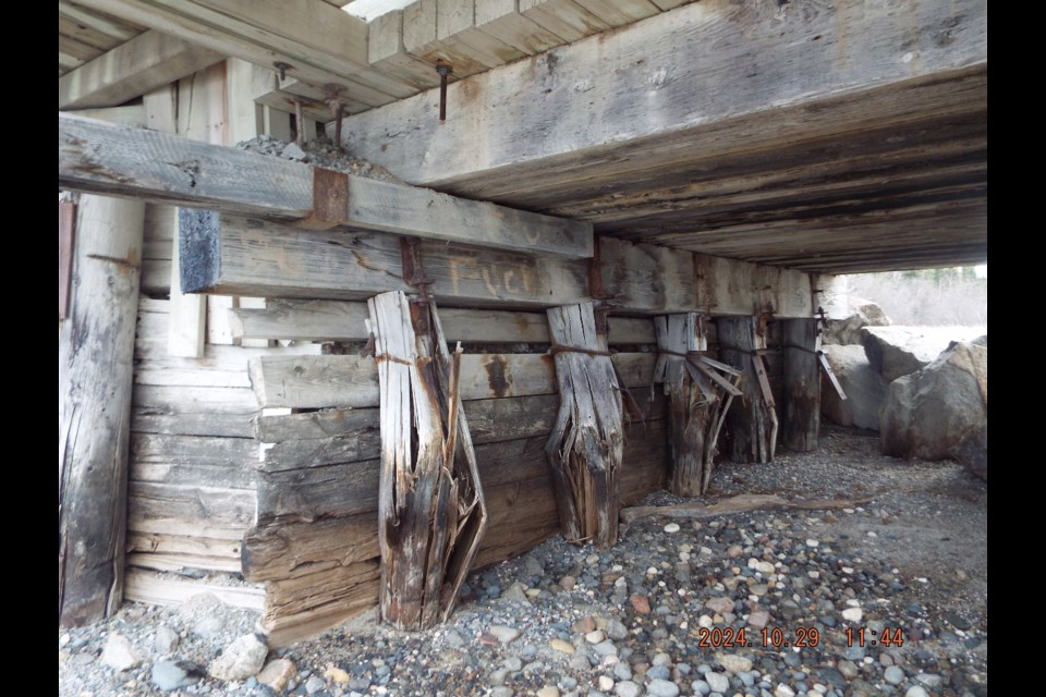 "Severe splitting and failure of piles" along the north abutments of the Making Ground River Bridge.