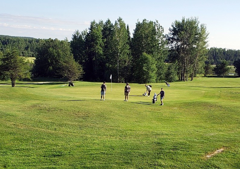 Golfers Photo by Marya Kalen