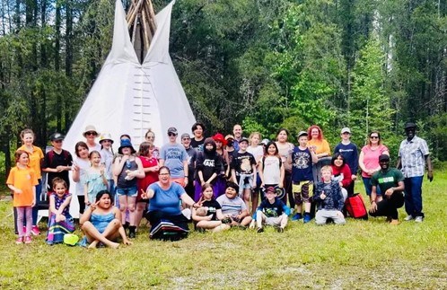 Students from St. Joseph Catholic School gather on cultural land.
sncdsb.on.ca