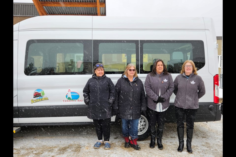 Officials from NOSH, Terrace Bay, and Schreiber gather with the Handi-Transit Joint Committee to inaugurate the newly commissioned van on Dec. 11, 2023.