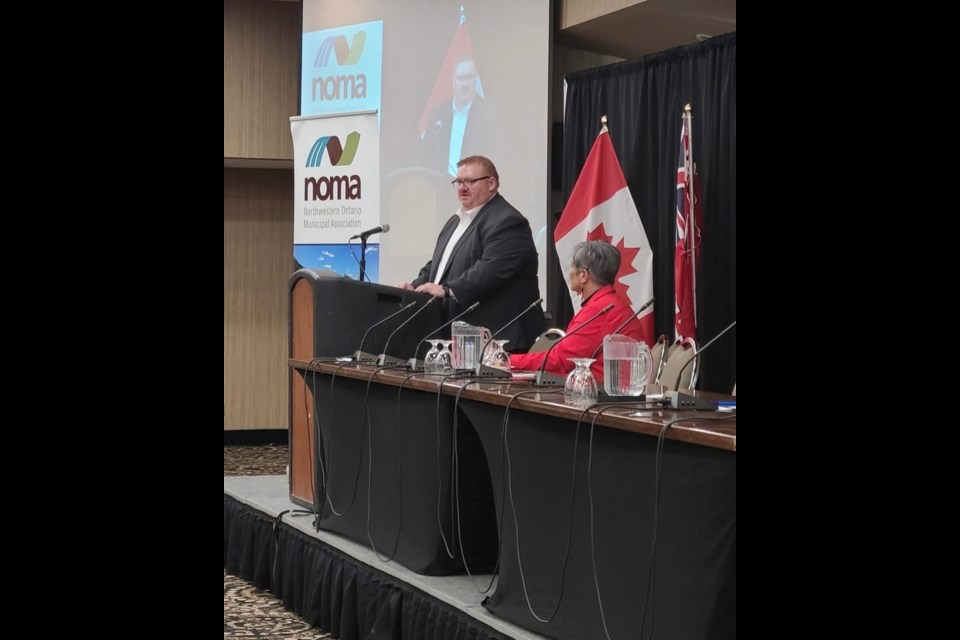 Minister of Natural Resources and Forestry, Graydon Smith, addresses municipal representatives at the NOMA conference on April 25, 2024. 