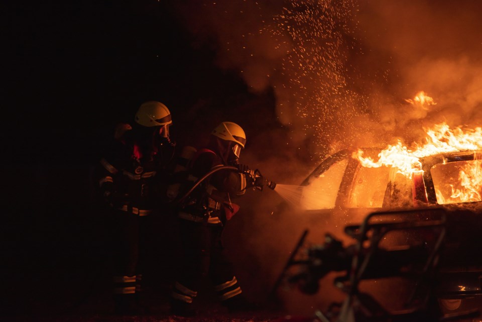firefighters-heavy-car-blaze