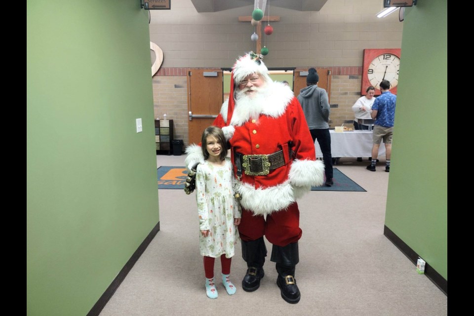 Daughter of Cliff and Jennifer Hendly at Sault Wesleyan Church on Tuesday, Dec. 20, 2022 for a foster care family Christmas 