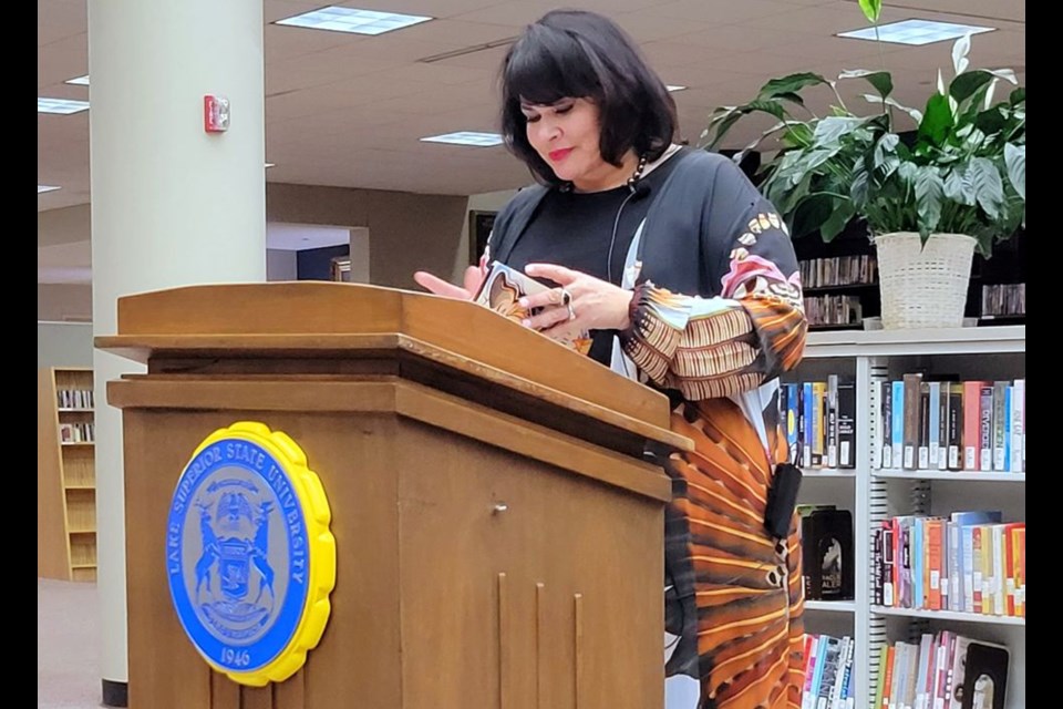 Angeline Boulley reads to the approximately 150 attendees at the Lake Superior State University library on Wednesday.