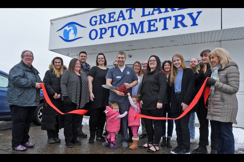 Dr. Thomas Choponis was joined by wife, Stephanie, their two children, staff members, chamber, and ambassadors on Wednesday, Jan. 25, 2023 to cut the red ribbon