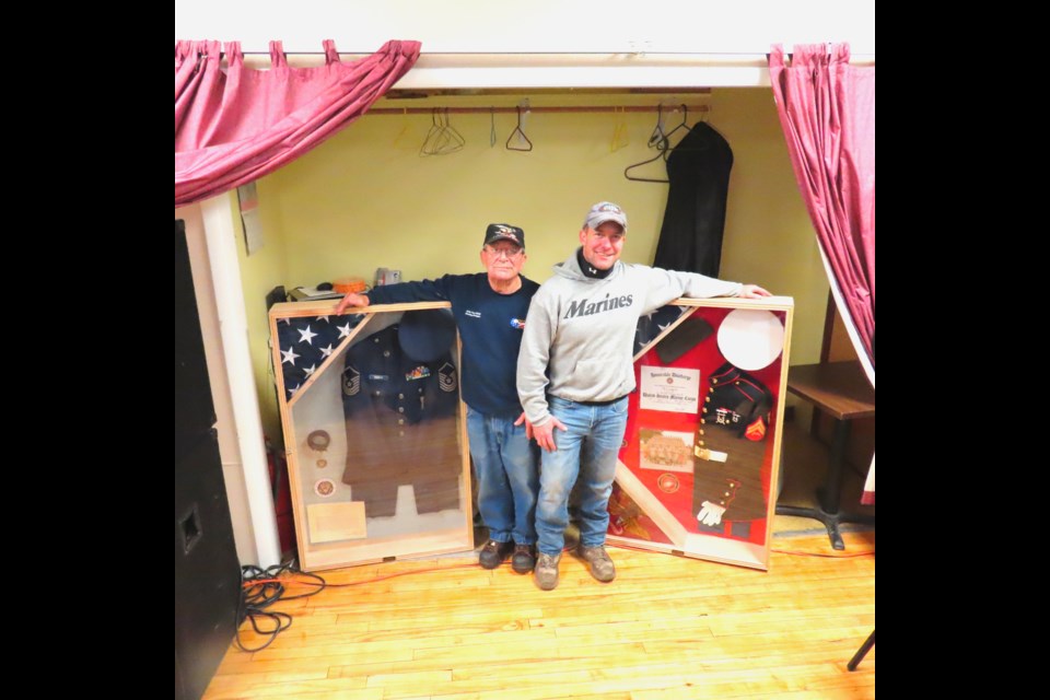 Father and son, Al and Patrick Romeri, receive a special Veteran's Day surprise Saturday, Nov. 12 from Jim Roth and friends at VFW Post 9023 in the 11th off-road-vehicle veterans fundraiser