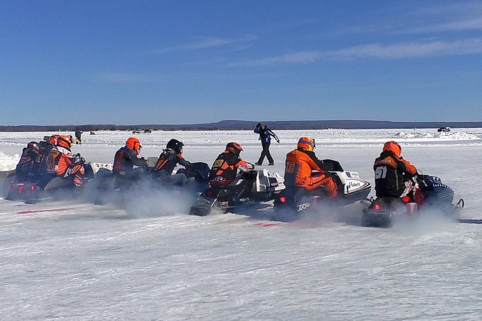 Hundreds of sledders took part in the annual Fire on Ice Vintage Snowmobile Races to raise funds for  Raber Township Volunteer Fire Department.