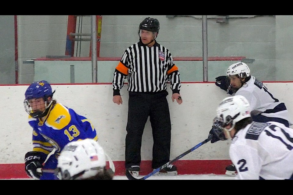 60-year-old Murray Meehan continues to officiate hockey games