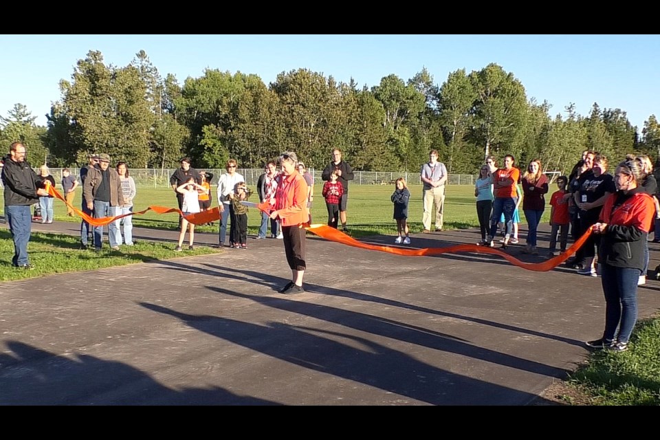 A ribbon cutting ceremony was held Wednesday evening at the Rudyard High School track.