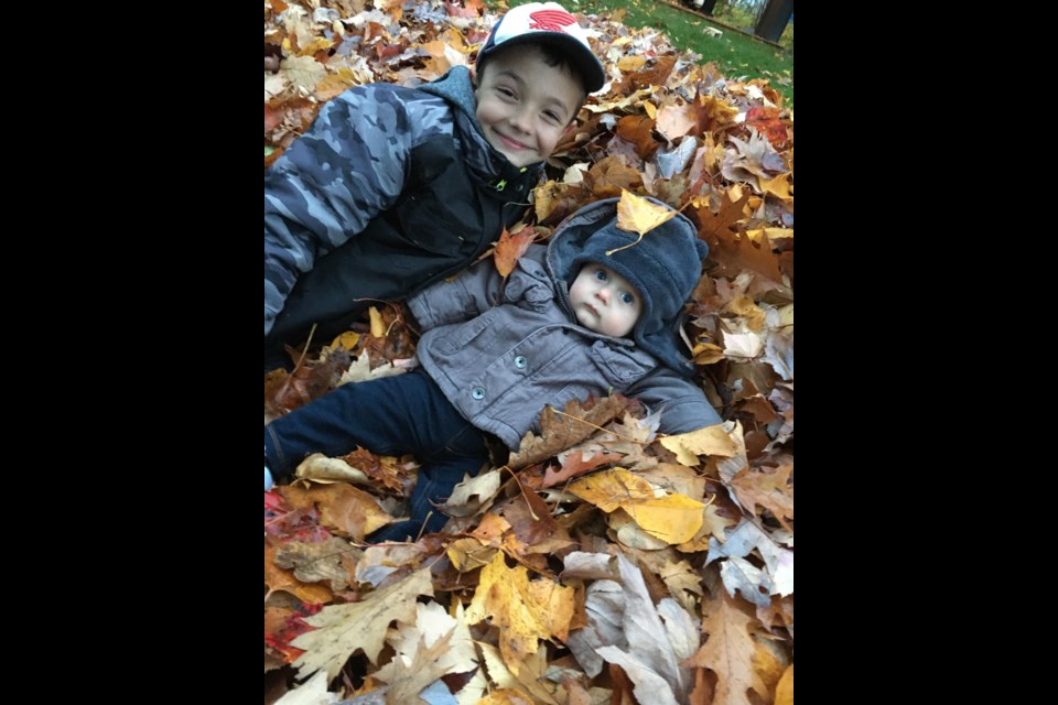 Wyatt Mageran, 9, and Russell Mageran, eight months, are excited to hopefully get their snowman building business up and running. 