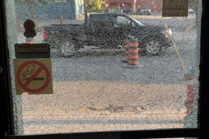 Downtown bar owner suspects gunfire shattered front door