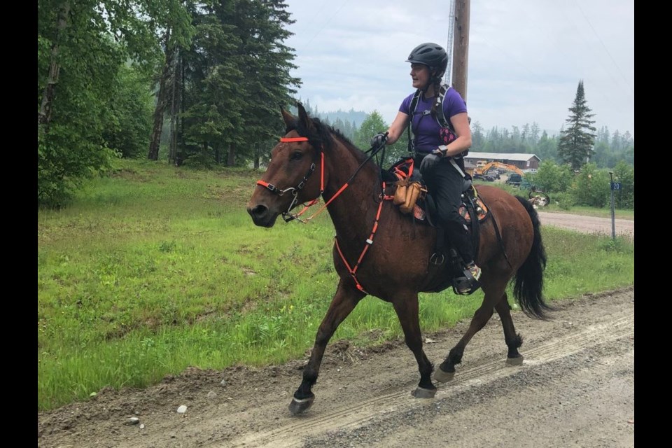 Carol-Anne Robinson crosses the finish line in her first virtual 40km endurance trail ride.