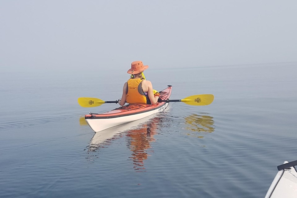 That’s Patty and her husband is in the white kayak. They paddled to Goulais Bay from Gros Cap that day. It took them five hours.