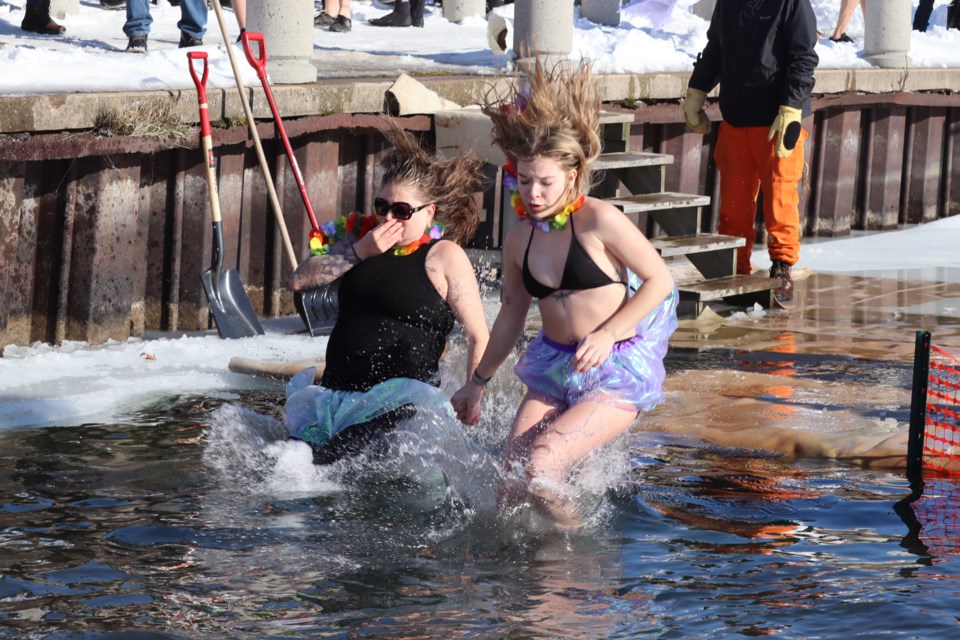 Dozens of courageous locals made the chilly dive into the St. Mary's River as part of Bon Soo's Polar Bear Swim on Feb. 11, 2023. 