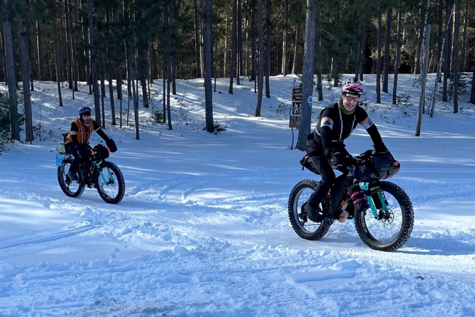Local fat biking fanatics Reg Peer (left) and Jan Roubal completed the Polar Roll Ultra, a 140-mile course in the Marquette area, on Feb. 20.