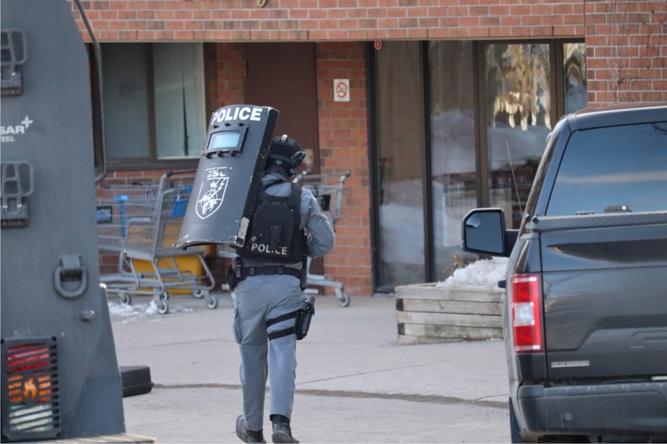 Five Sault Ste. Marie police cruisers and a tactical unit are on the scene at the Columbus Club of Sault Ste. Marie Housing Corporation in the 200 block of Northern Avenue East.