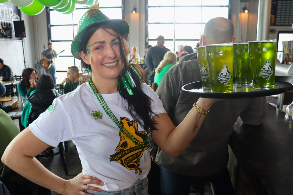 Tall, cool glasses of refreshing green beer were flying out of the bar at Northern Superior Brewing Co. during St. Patrick's Day festivities on March 17, 2024.