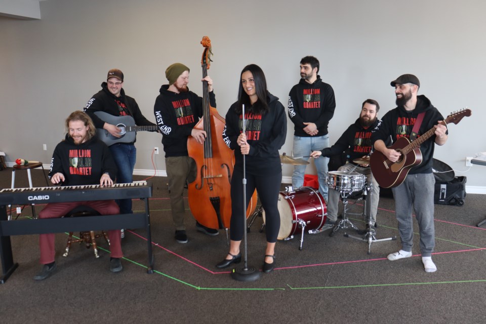 Cast members of the upcoming jukebox musical Million Dollar Quartet rehearse upstairs at the SK Group on Mar. 19, 2023. 