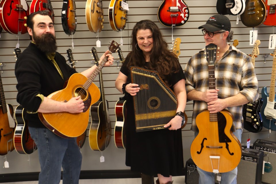Case's Music owners Jake and Lee Rendell, alongside music instructor Craig West, show off some classic instruments they recently acquired from the late Jerry Legacy, a well-known collector and musician in town.