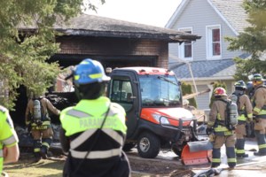 PHOTOS: Emergency crews respond to garage fire on Peoples Road
