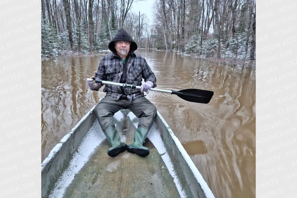 Goulais residents Jay Riggins (pictured above) and his wife Robin have to canoe in and out of their Byes Side Road home when severe flooding strikes.