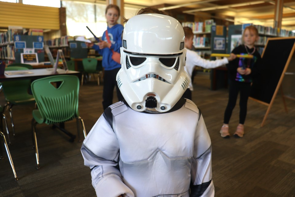 Kids earned their Jedi Knight certificates during a fun day of Stars Wars-themed activities and games at the downtown library on May 4, 2024.