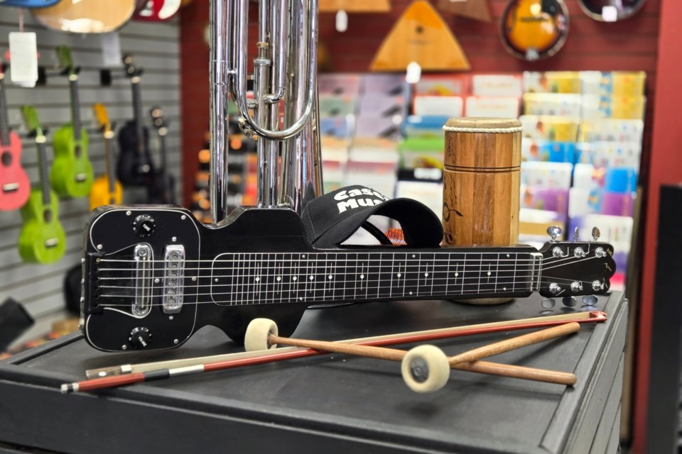 After it was stolen last month, Jerry Legacy's lap steel guitar has returned to its proper home and is once again being proudly displayed inside Case's Music.