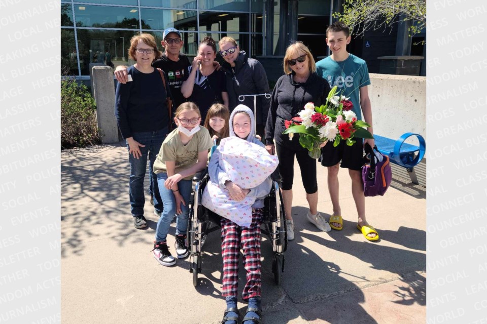 11-year-old Ruby Kerr is surrounded by members of her relieved family after she went missing for 30 hours in the Sault wilderness between Friday morning and Saturday afternoon.