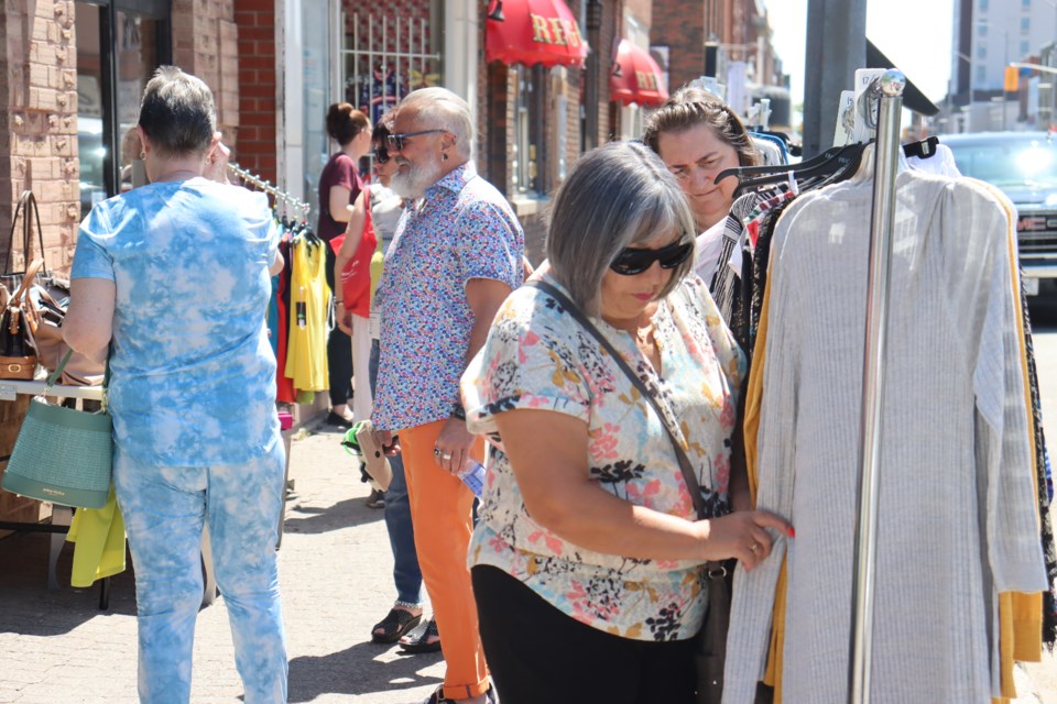 Hosted by the Downtown Association of Sault Ste. Marie, the Sault's Longest Garage Sale invited hundreds of residents to shop from a variety of vendors, businesses, and stores along Queen Street on May 27, 2023.