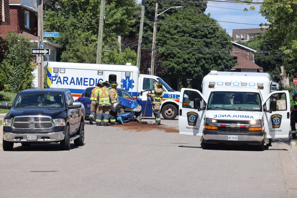 Paramedics, fire crews, and police officers respond to a Sunday afternoon collision on the corner of Albert Street East and March Street.