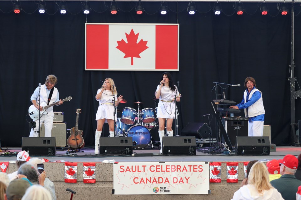 (from left to right) ABBA Soo members David Repath, Janet Brown, Kerry Beacock, and Mark Allemang make their debut at the Roberta Bondar Pavilion on Canada Day.