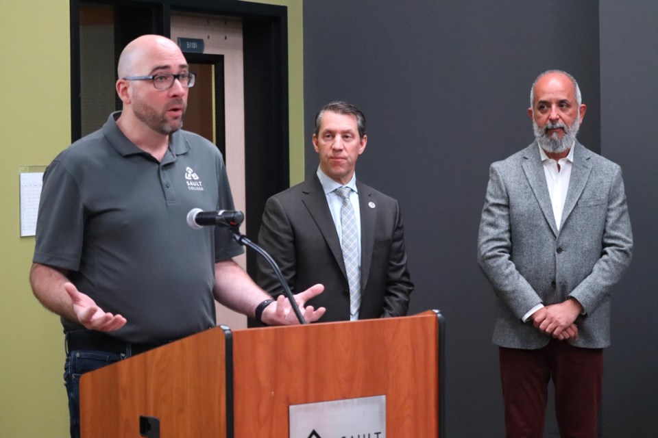 Sault College's Robotics and Mechanical coordinator Donovan Kennedy (left) expressed his gratitude after college president David Orazietti (middle) and Heliene Inc. CEO Martin Pochtaruk (right) announced the donation of robotics equipment.