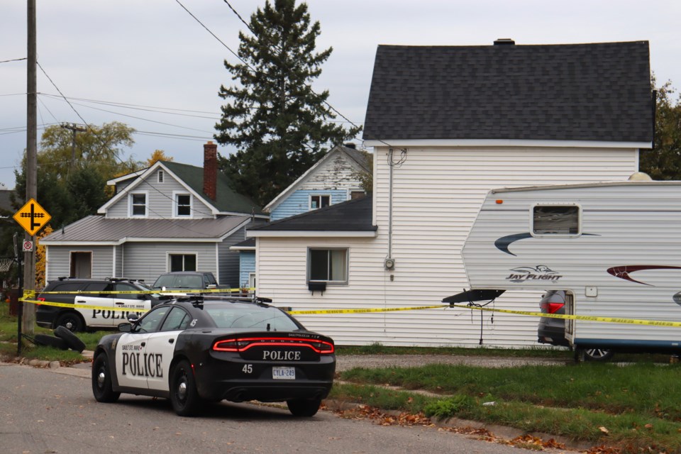 Police remain on scene in the 200 block of Tancred Street, one of two Sault Ste. Marie homes that were involved in fatal shootings late Monday evening
