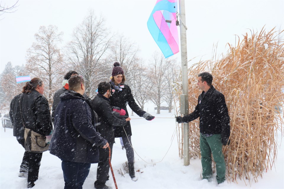 The Sault Pride Community came together at city hall on Sunday to raise the transgender flag for the first time in honour of Trans Day of Remembrance. 
